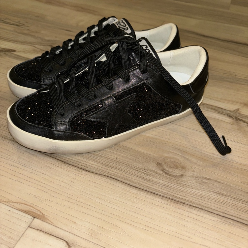 Authentic golden goose. Black shiny